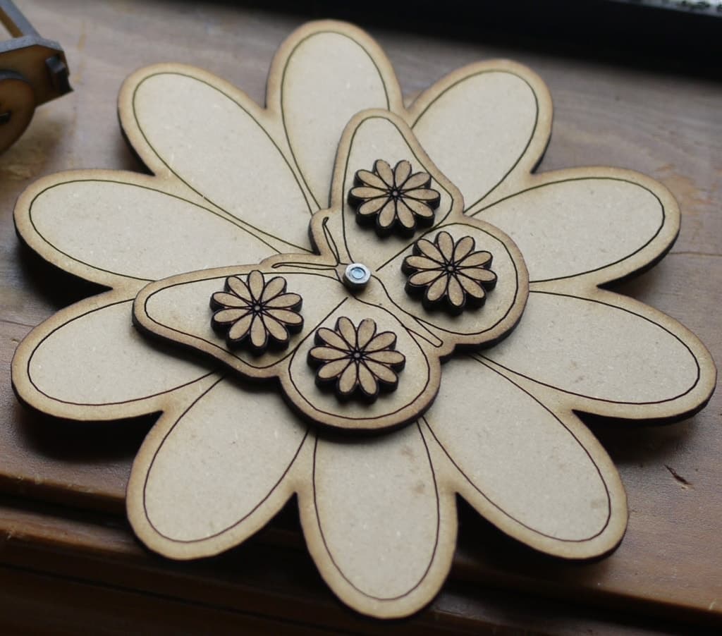 Interactive Spinning Butterfly on Flower Laser Cut SVG File